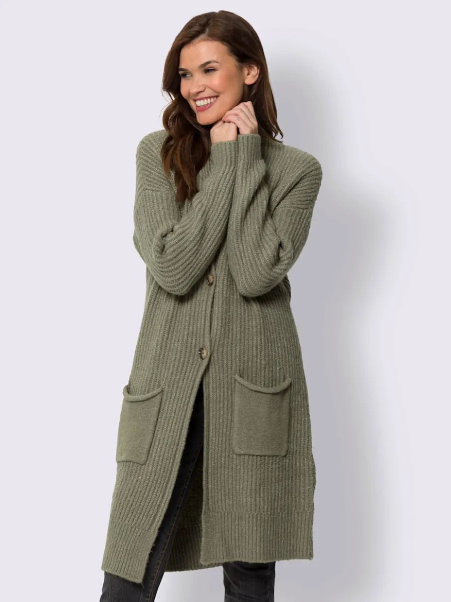 Veste en tricot doux à grosses mailles avec poches