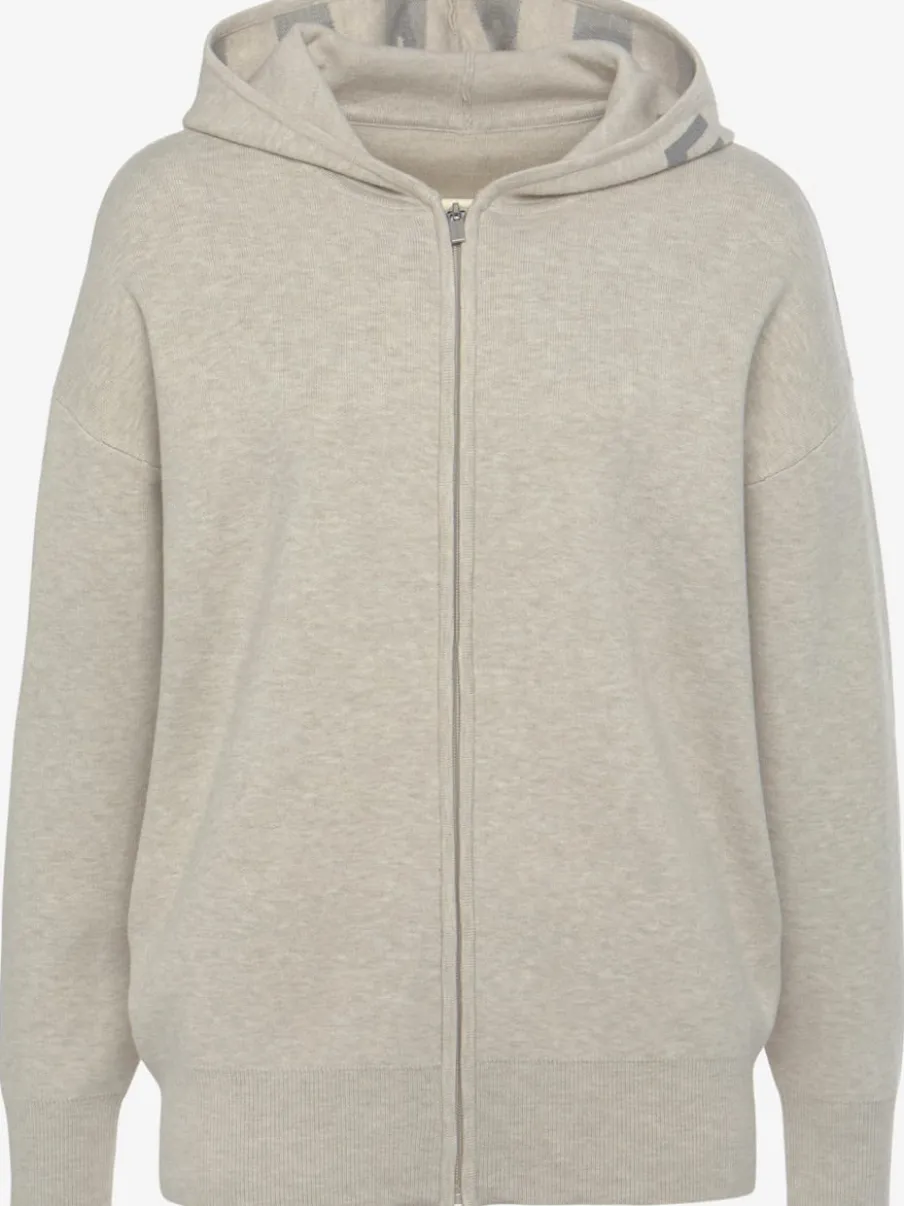 Veste en tricot doux à manches longues avec capuche
