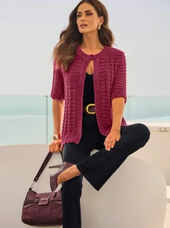 Veste en tricot fil avec paillettes incrustées