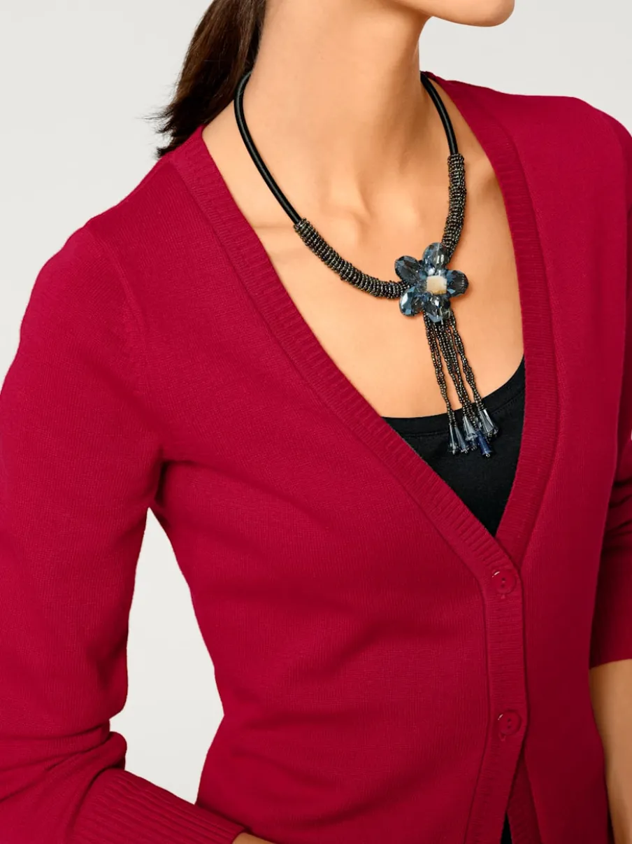 Veste en tricot fin avec col en V et motifs floraux