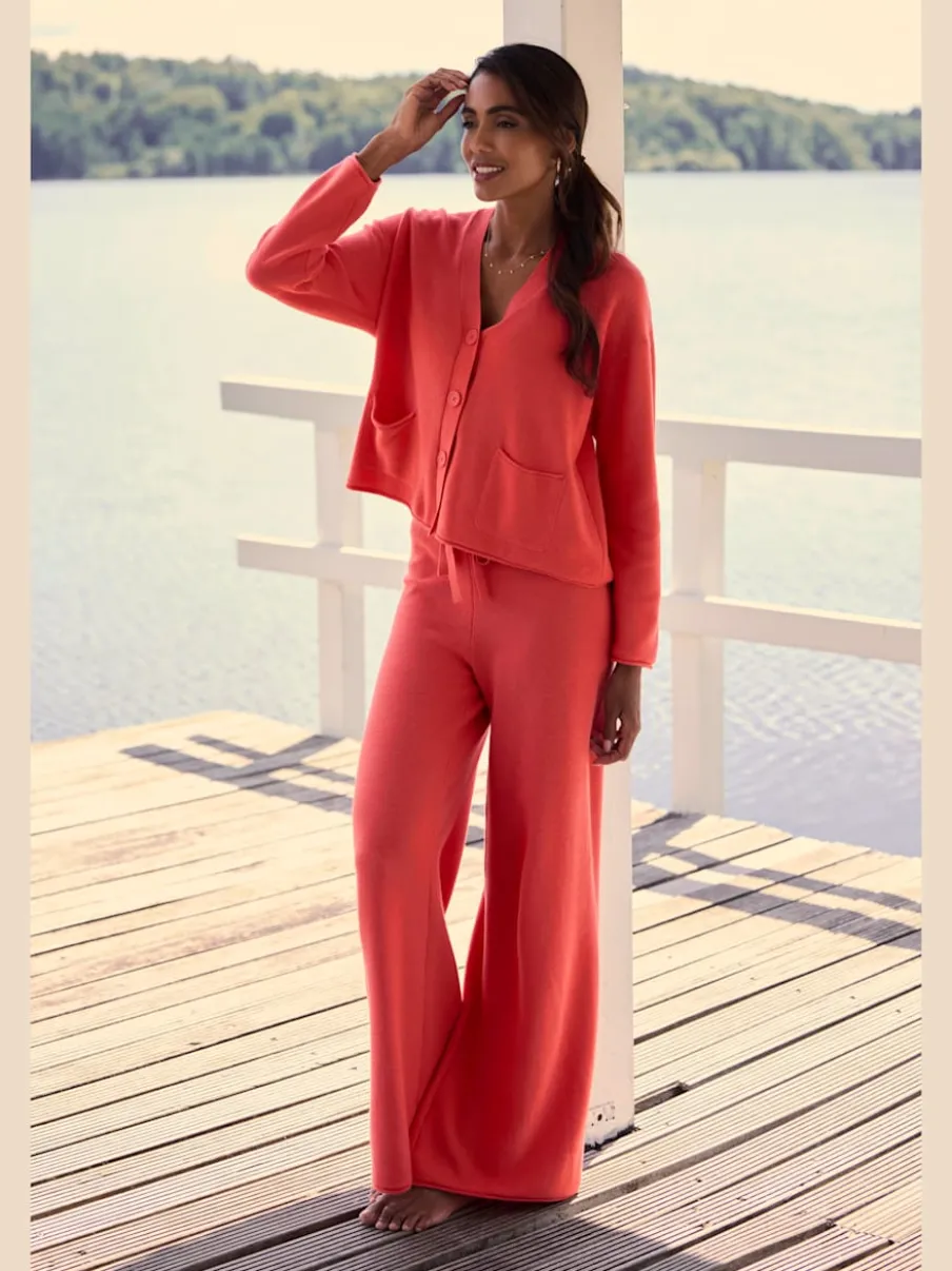 Veste en tricot fin avec mancherons et poches plaquées