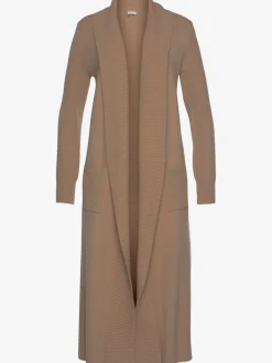 Veste en tricot long avec col châle et poches ouvertes