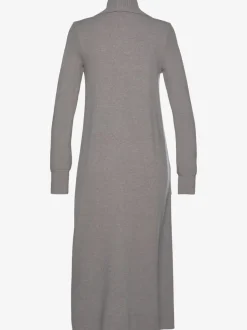 Veste en tricot long avec col châle et poches ouvertes