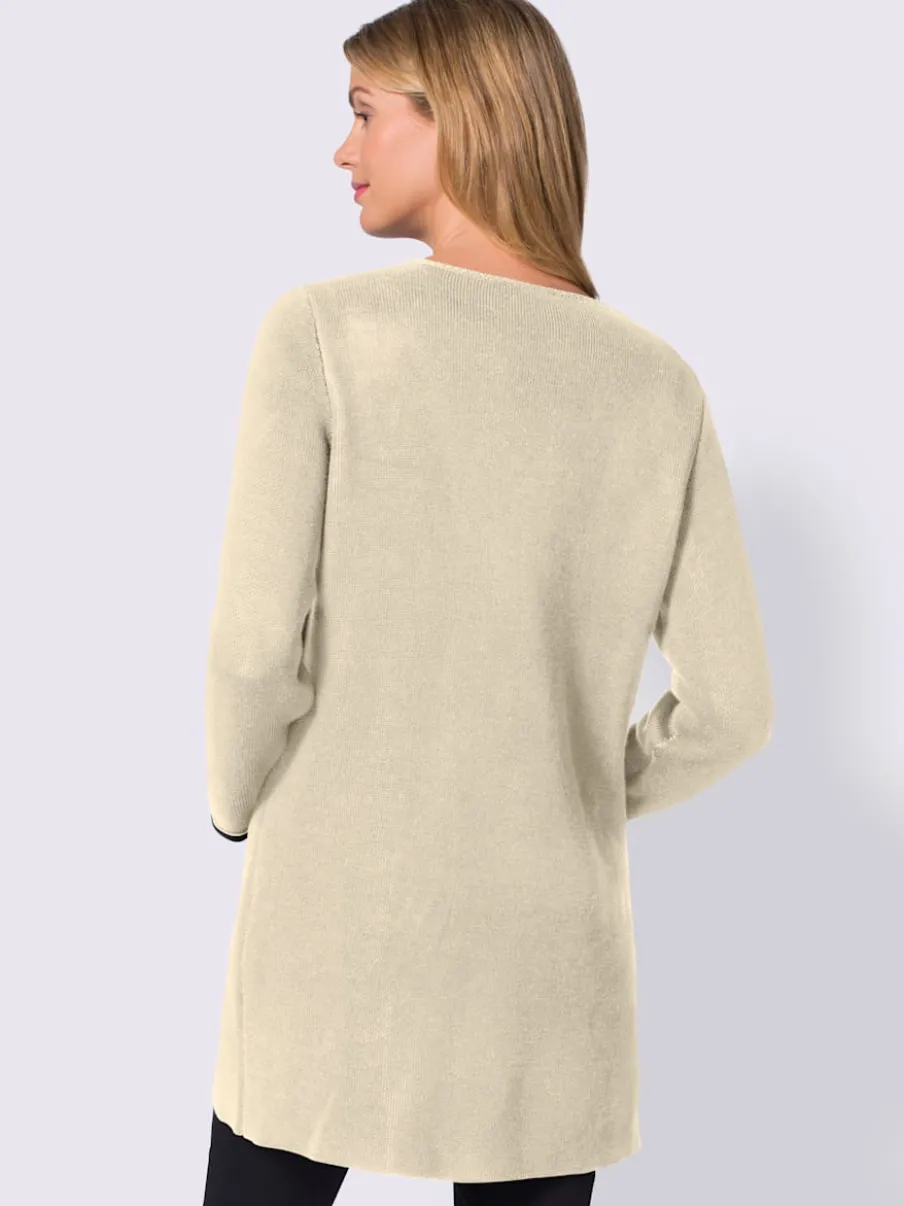 Veste en tricot à manches longues avec poches pratiques