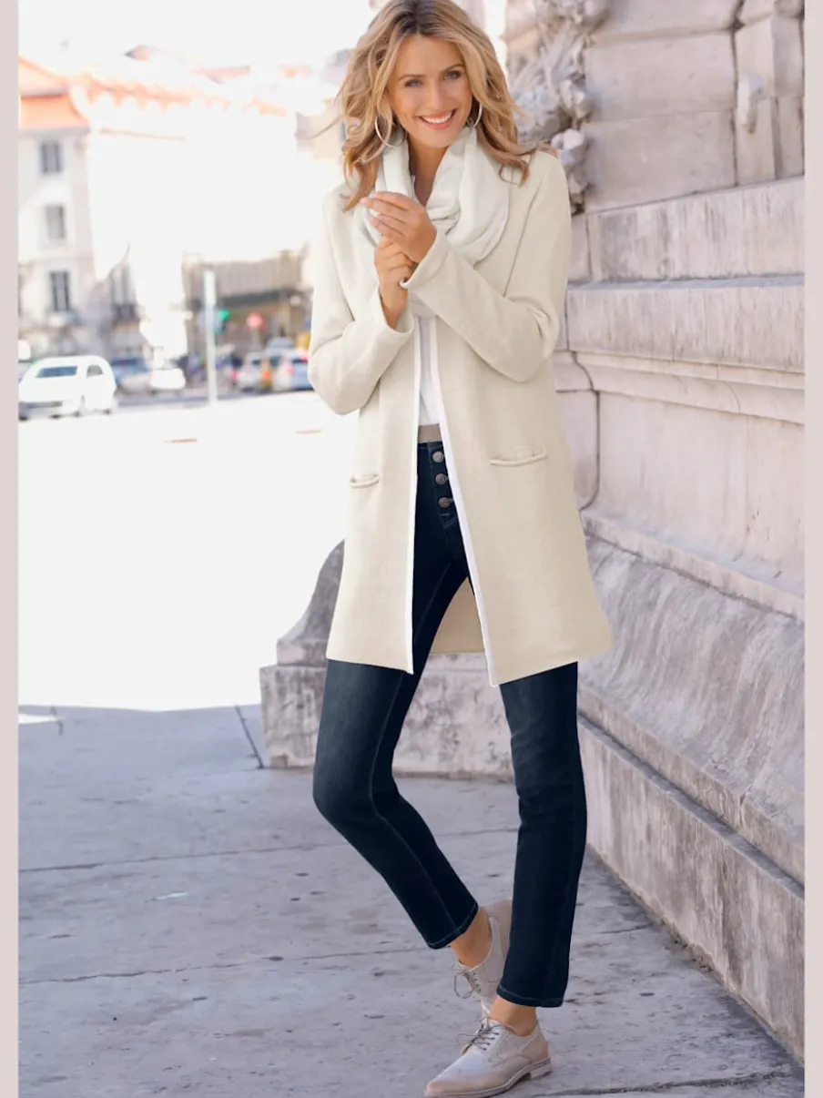 Veste en tricot à manches longues avec poches pratiques