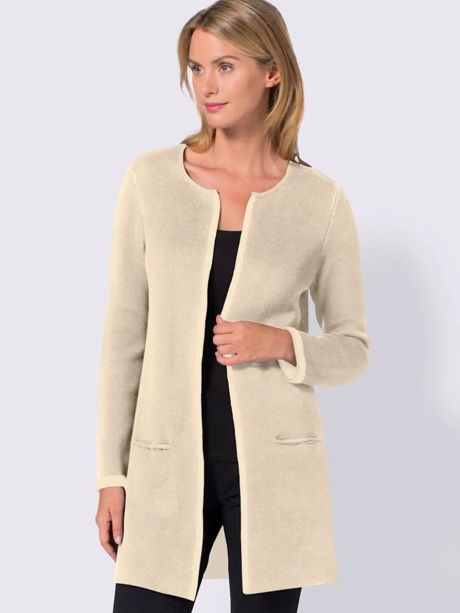 Veste en tricot à manches longues avec poches pratiques