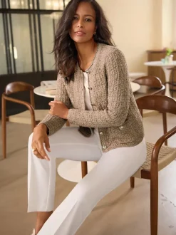 Veste en tricot motif brillant encolure ronde et poches