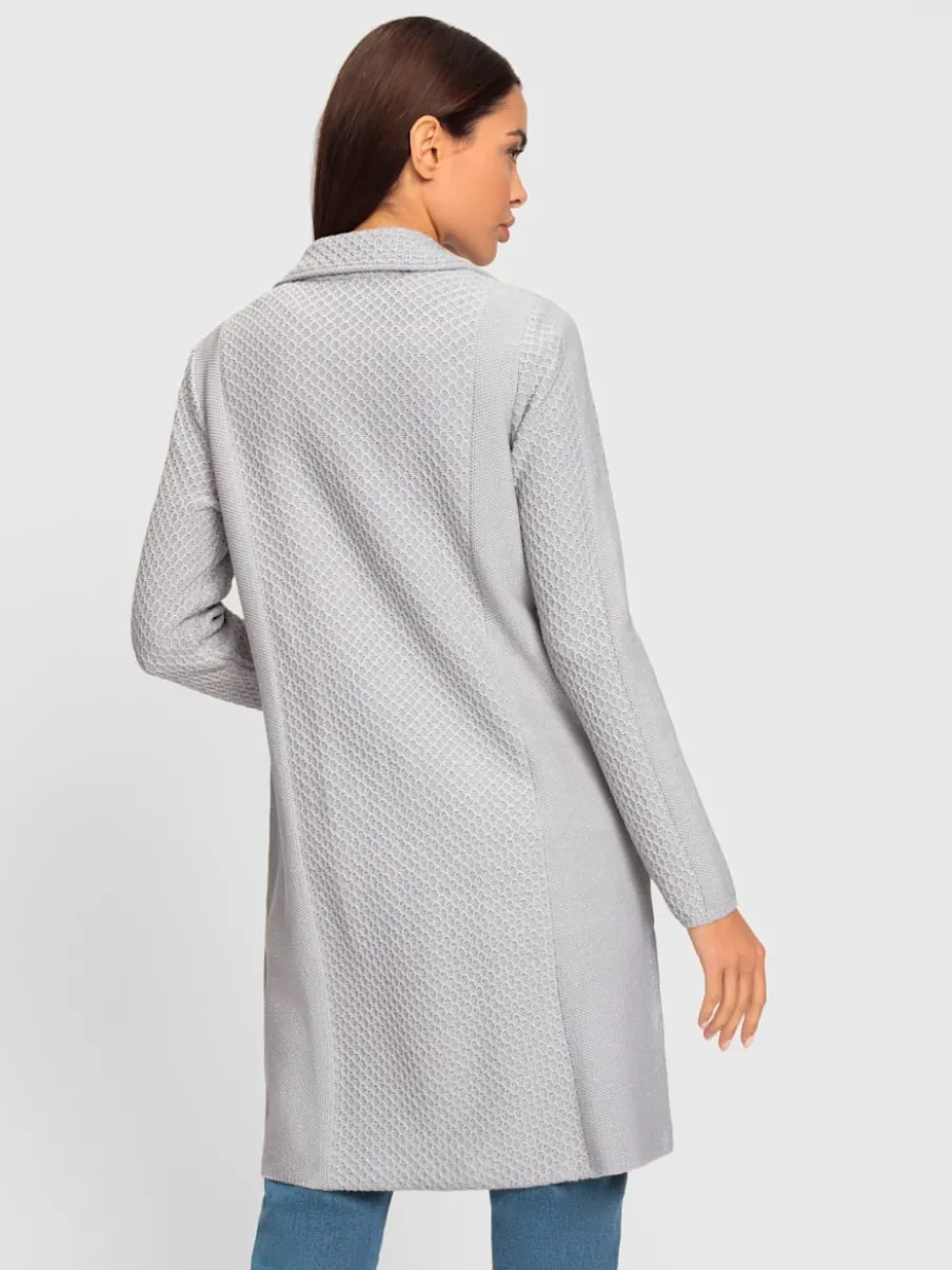 Veste en tricot à motif sportif et poches plaquées