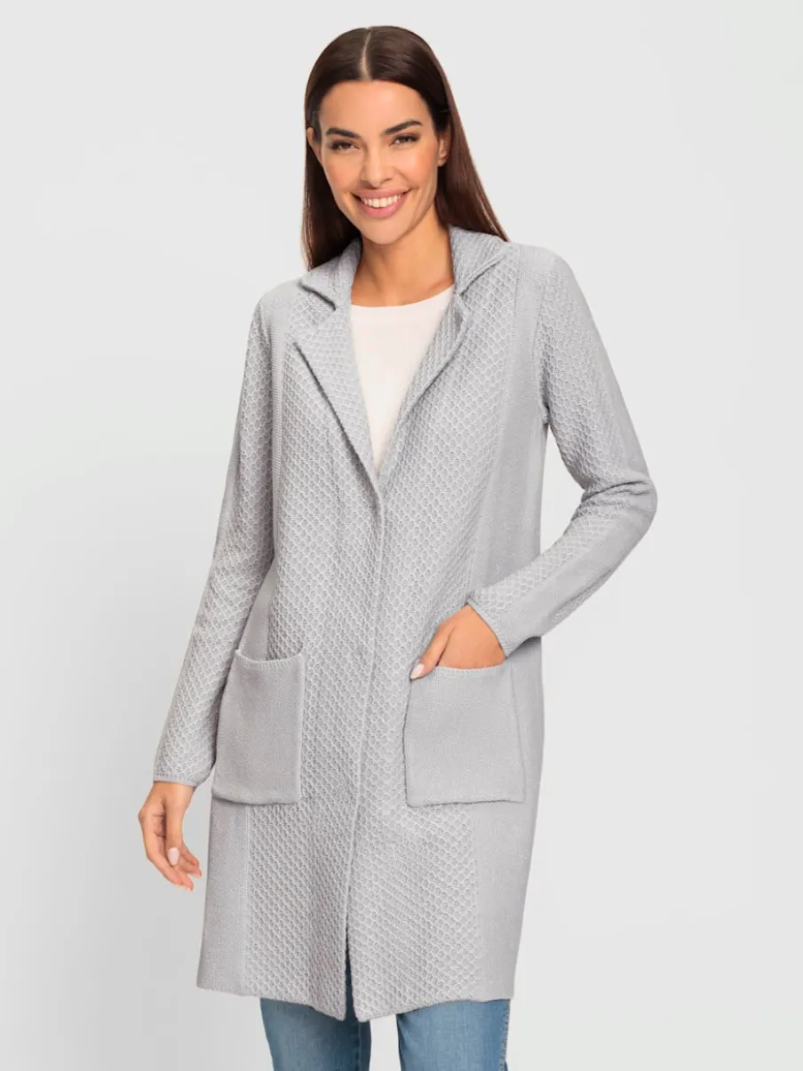 Veste en tricot à motif sportif et poches plaquées