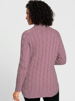 Veste en tricot torsadé avec col montant et poches