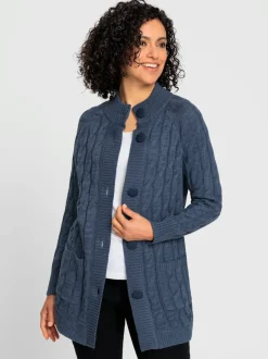 Veste en tricot torsadé avec col montant et poches