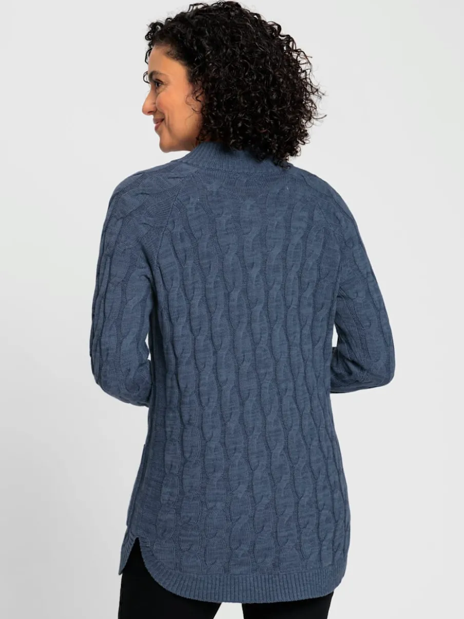 Veste en tricot torsadé avec col montant et poches