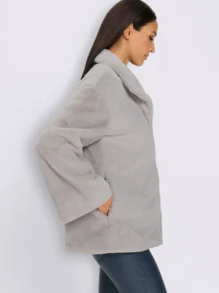 Veste imitation fourrure avec col montant et manches longues