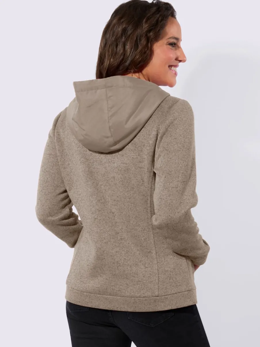 Veste légère avec capuche et poches intégrées élégantes