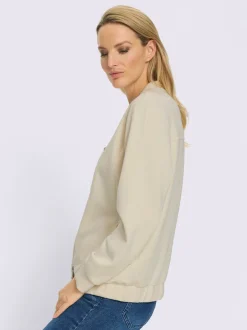 Veste légère à col montant avec glissière et bords-côtes extensibles