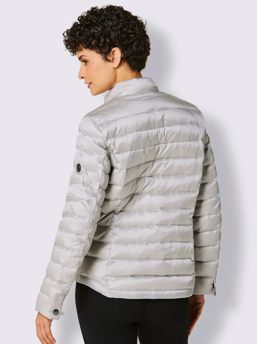 Veste légère en duvet avec col montant et poches