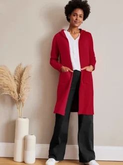 Veste longue en tricot avec capuche et fentes latérales
