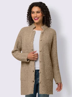 Veste longue en tricot avec col montant et poches plaquées