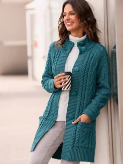 Veste longue en tricot avec col montant et poches