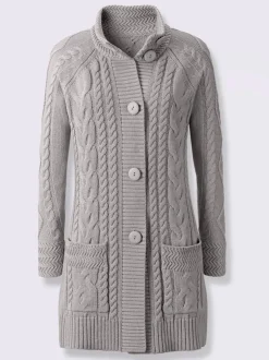 Veste longue en tricot avec col montant et poches
