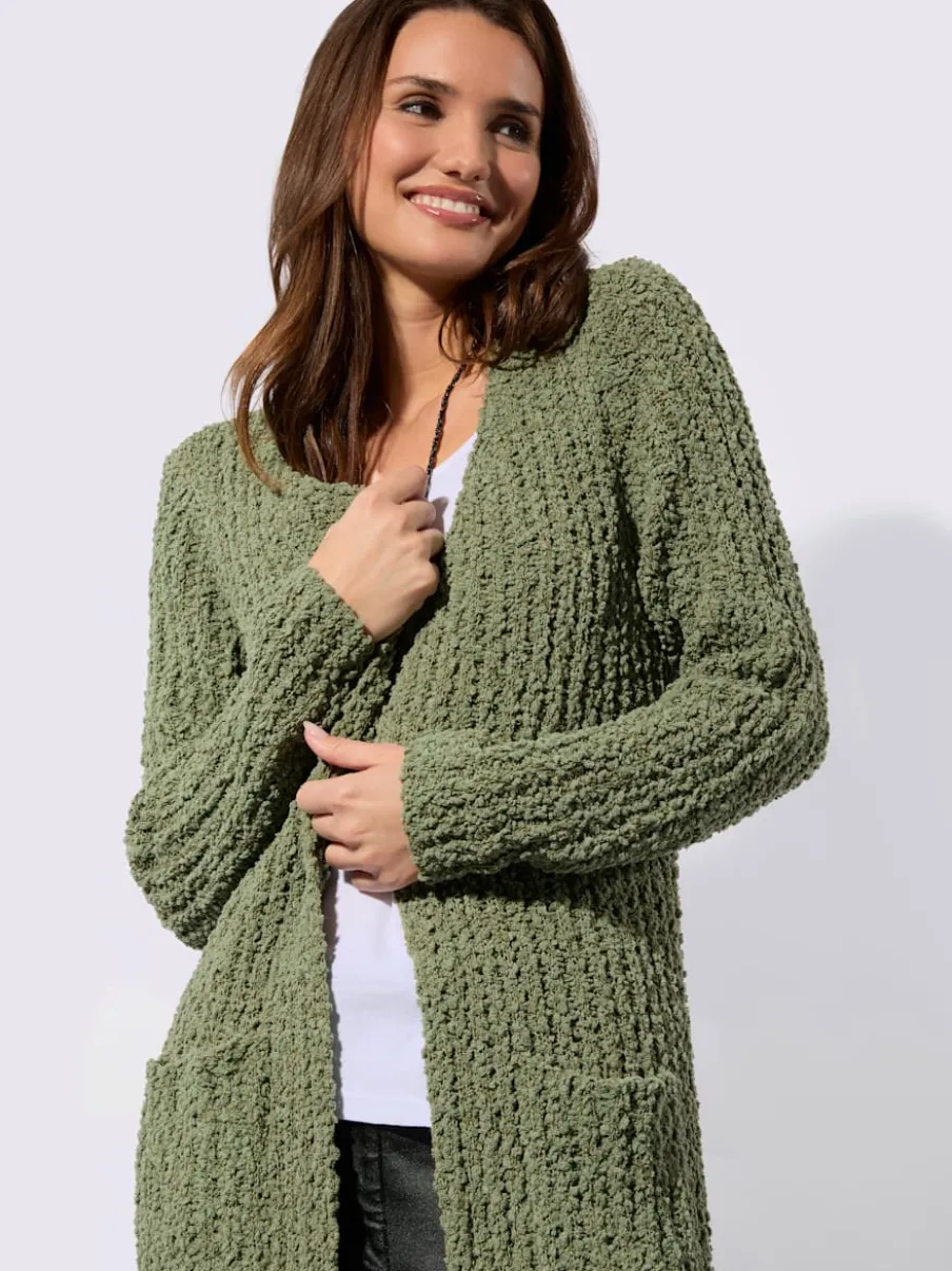 Veste longue en tricot avec manches longues et poches pratiques