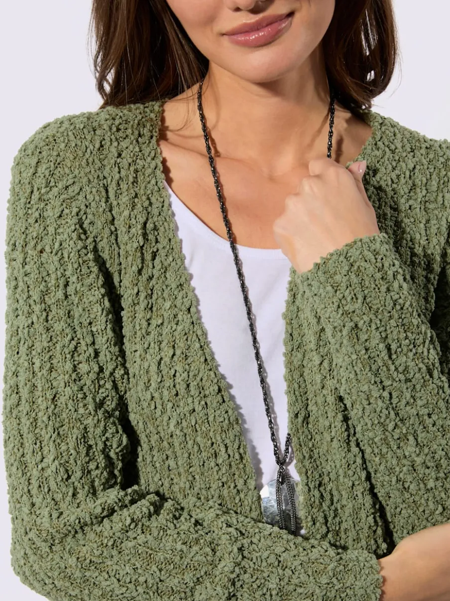Veste longue en tricot avec manches longues et poches pratiques