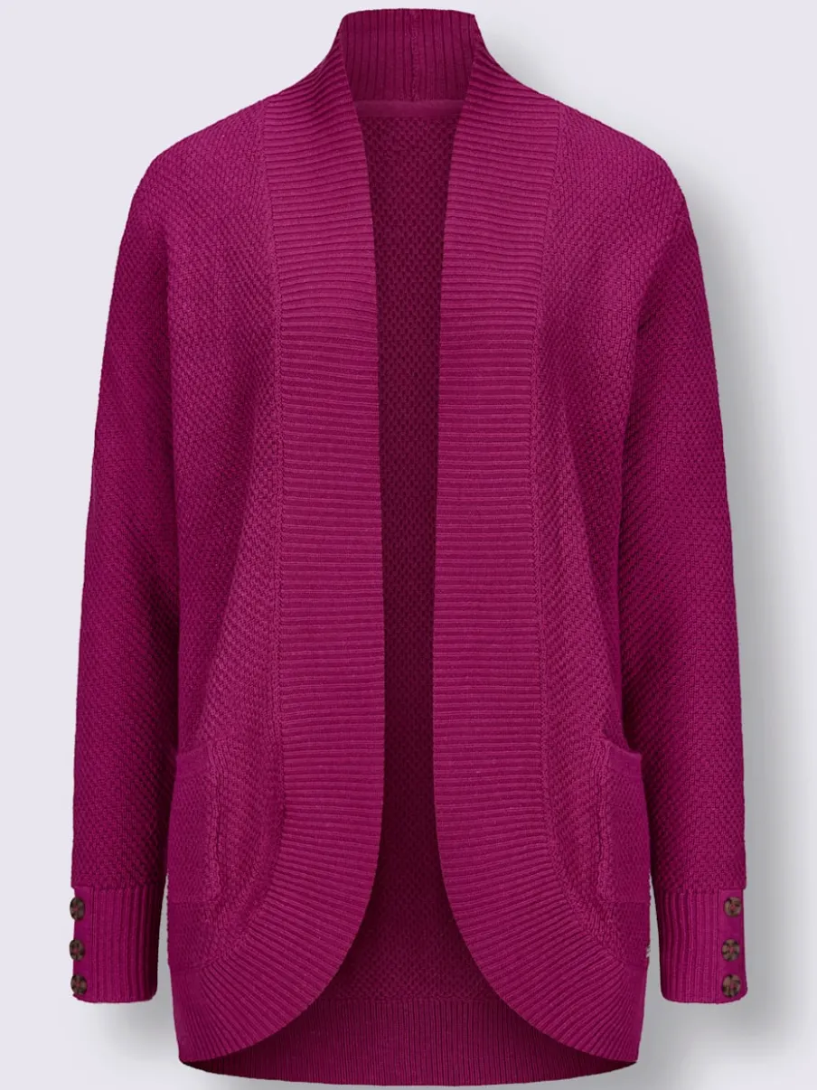 Veste longue en tricot avec poches et boutons côtelés