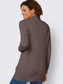 Veste longue en tricot avec poches et boutons côtelés