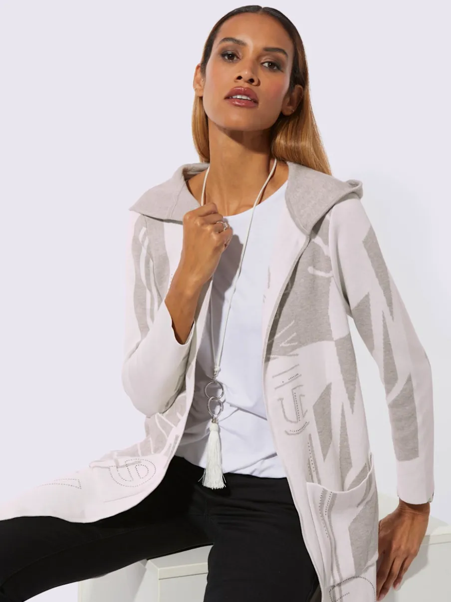 Veste longue en tricot à capuche avec motif graphique et poches