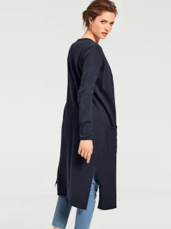 Veste longue en tricot à col montant avec poches et manches longues