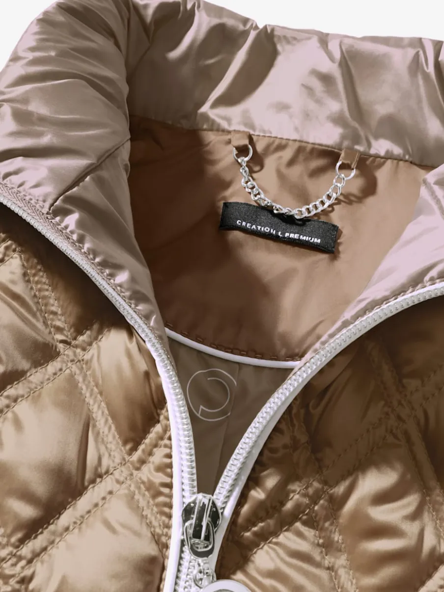 Veste matelassée en duvet avec manches amovibles et poches zippées