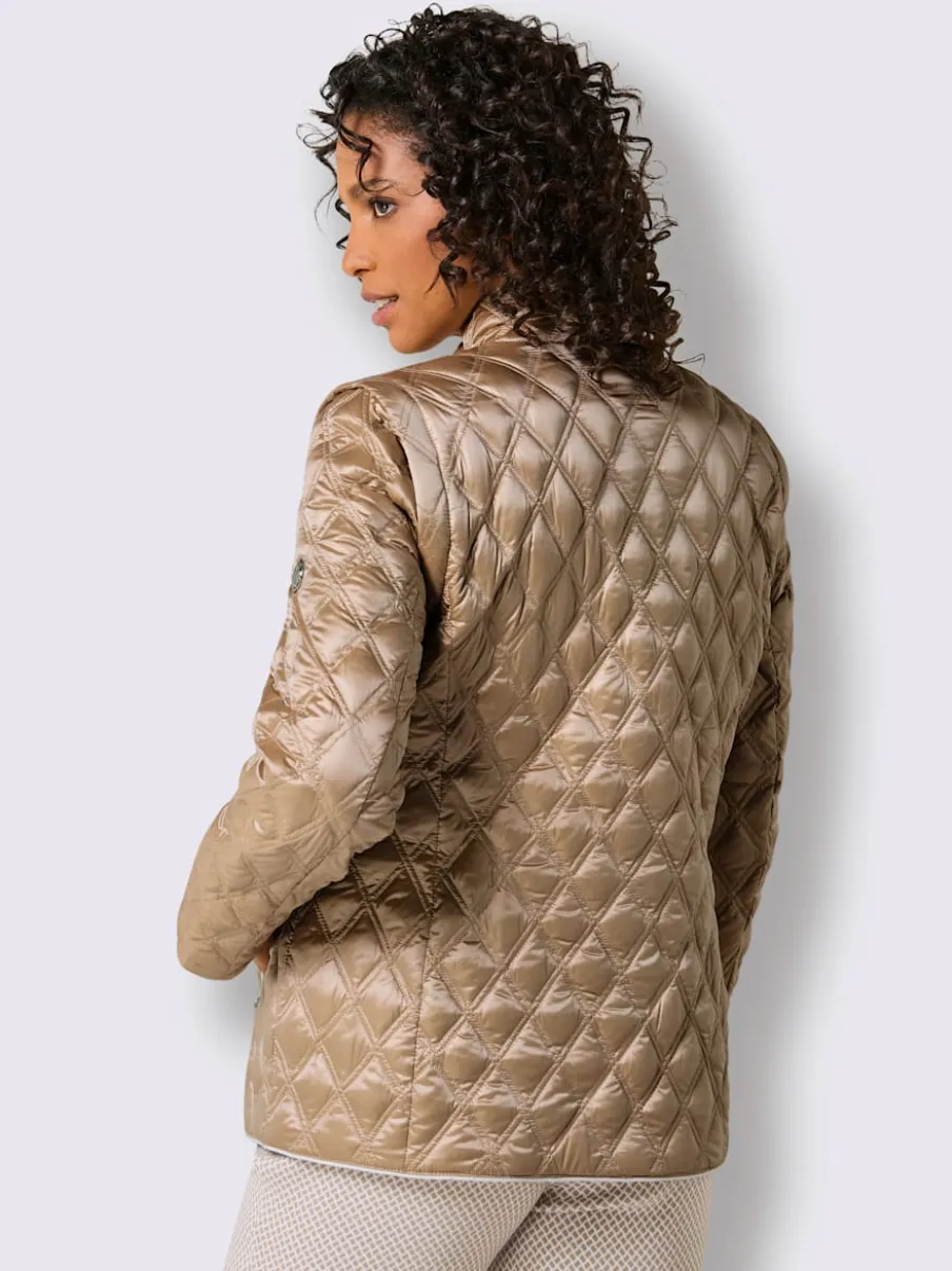 Veste matelassée en duvet avec manches amovibles et poches zippées