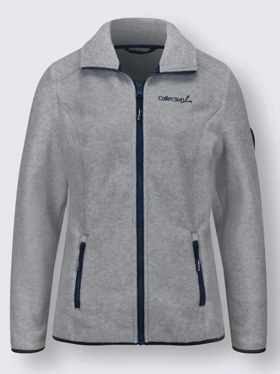 Veste polaire douce avec col transformable et poches zippées