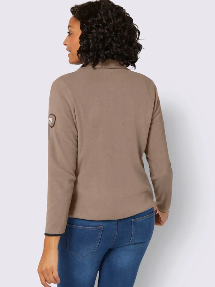 Veste polaire douce avec col transformable et poches zippées