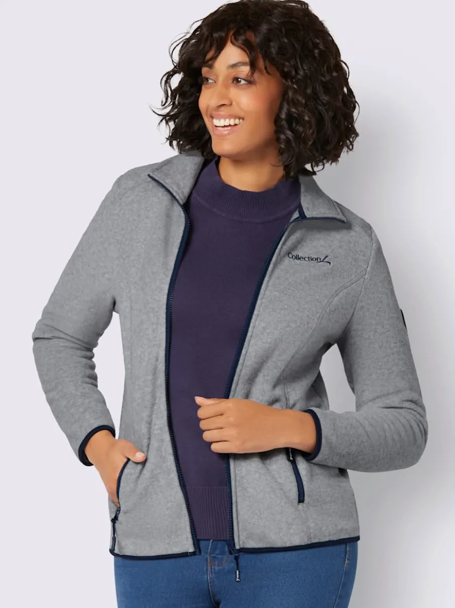Veste polaire douce avec col transformable et poches zippées
