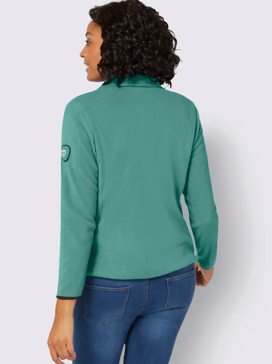 Veste polaire douce avec col transformable et poches zippées