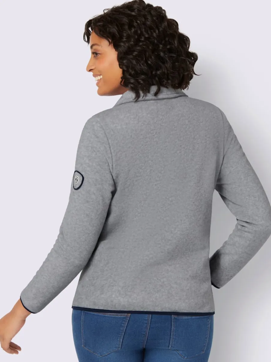 Veste polaire douce avec col transformable et poches zippées