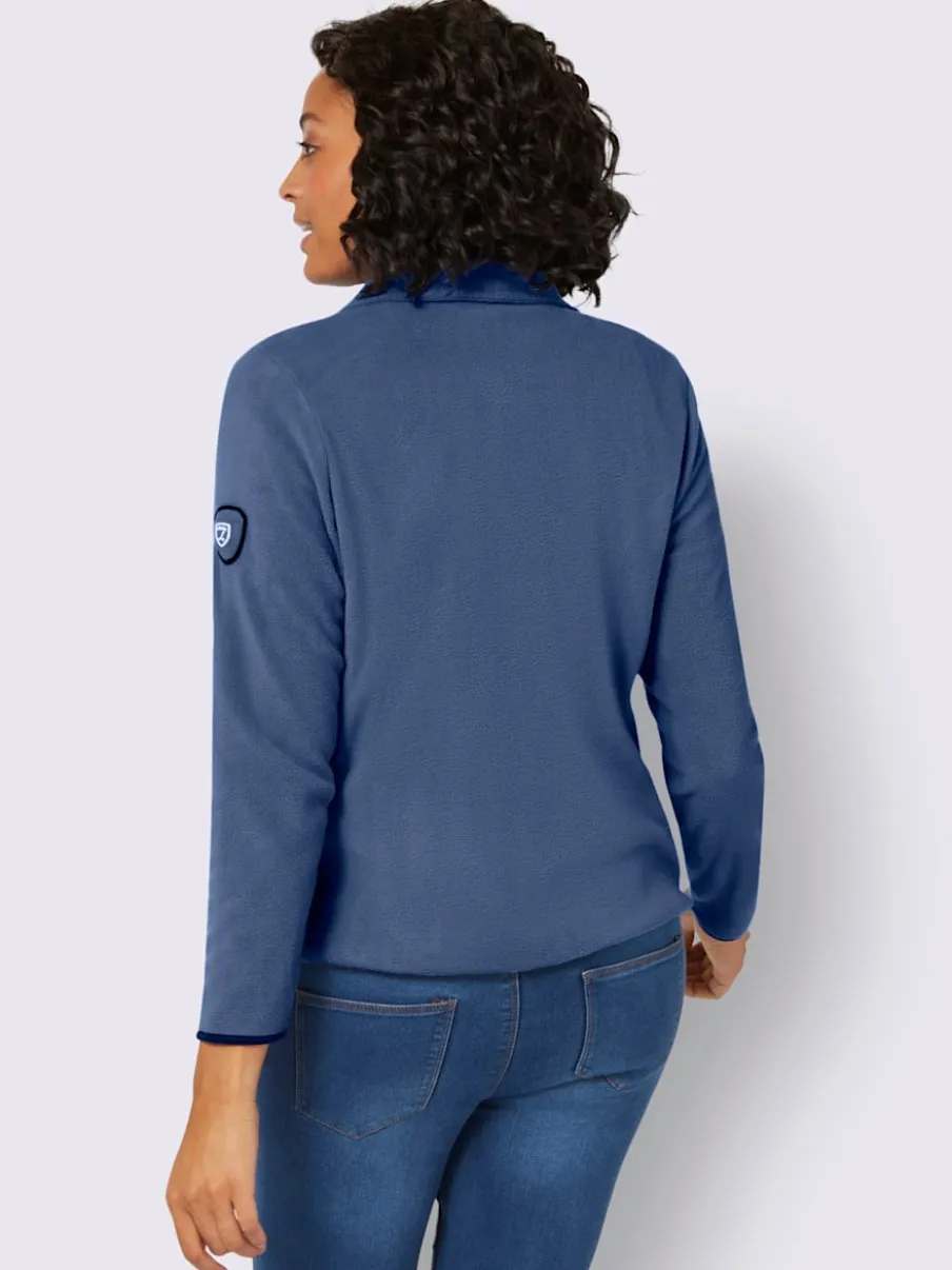 Veste polaire douce avec col transformable et poches zippées