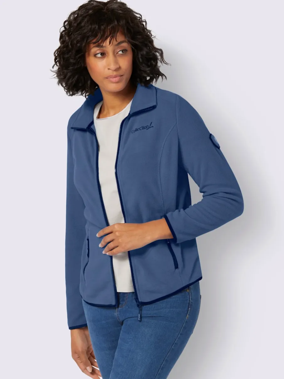Veste polaire douce avec col transformable et poches zippées