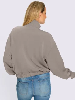 Veste sweat avec col montant et grandes poches