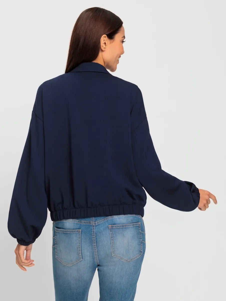 Veste sweat avec col montant et grandes poches