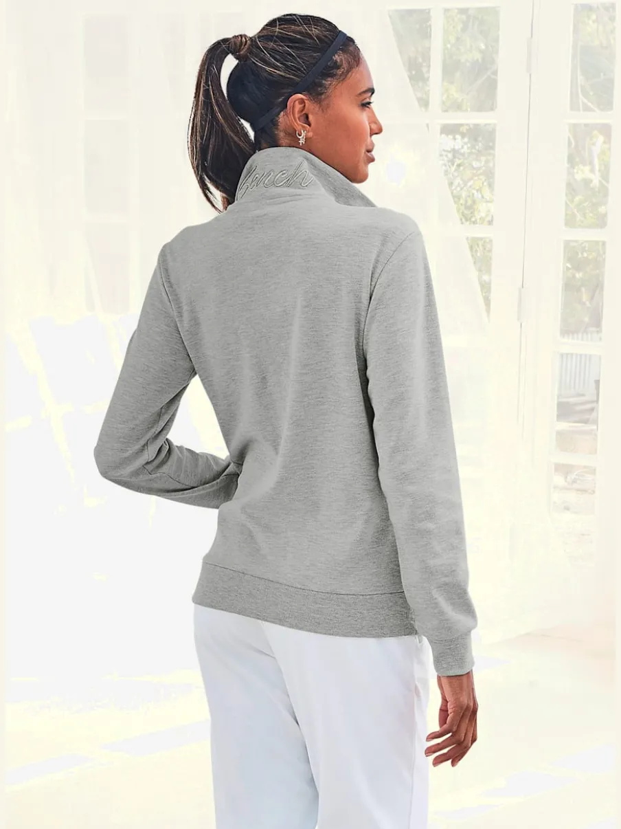 Veste sweat à col montant avec broderie et poches kangourou